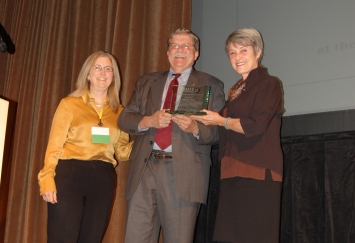 OTREC Director Jennifer Dill, left, poses with 2012 OTREC Award winner Andy Cotugno and Carlotta Collette, both of Metro.